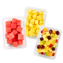 Ananas, mango of watermeloen blokjes of fruitsalade ananas/druif